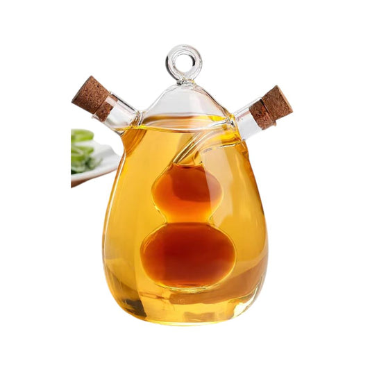 Bouteille d'huile en verre transparent