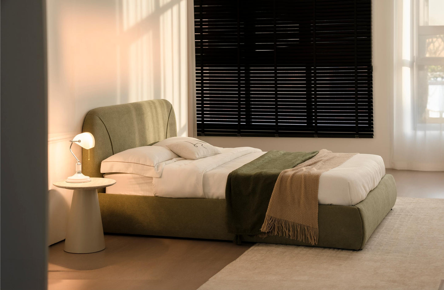 Lit en tissu vert avec sommier Softy